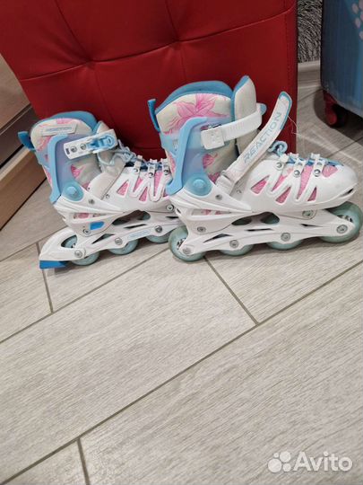 Роликовые коньки