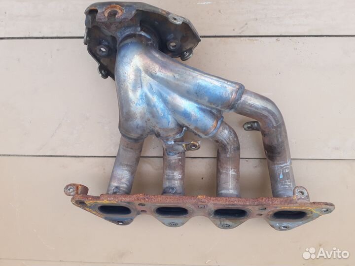 Коллектор выпускной Nissan Almera G15