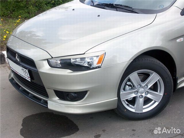 Реснички накладки спойлера Lancer X