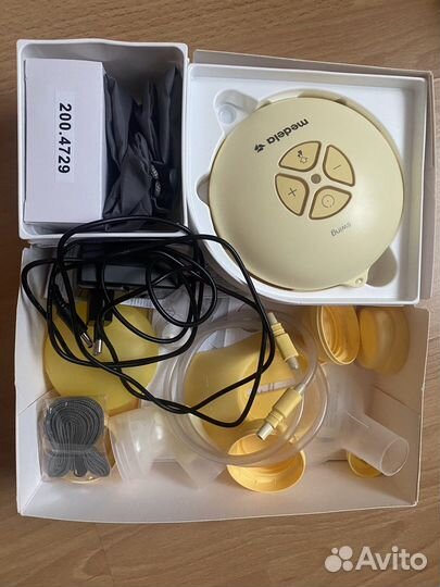 Молокоотсос medela swing электрический