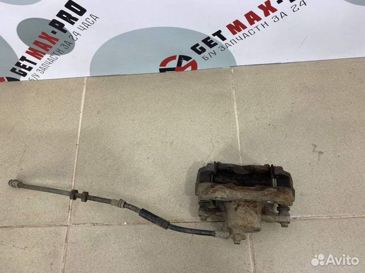 Суппорт тормозной передний правый Skoda Rapid 2013