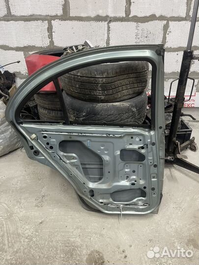 Дверь задняя левая Nissan Almera Classik