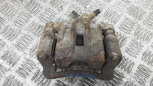 Суппорт тормозной задний левый KIA CEE'D 1 (ASE17L