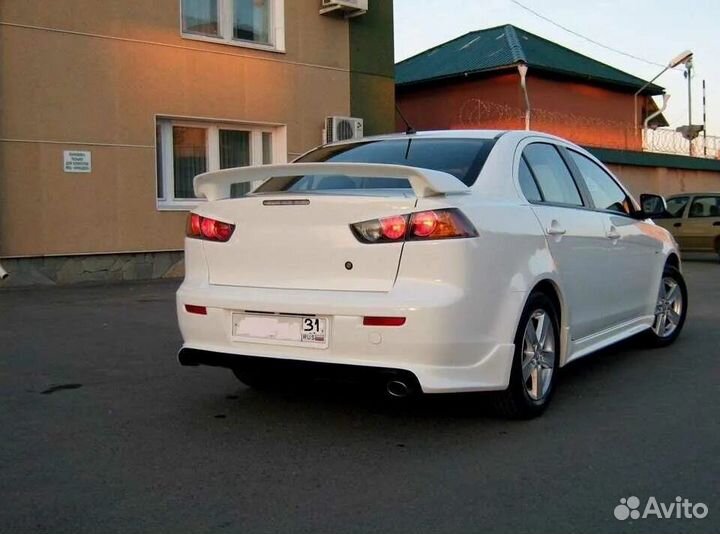 Юбка заднего бампера lancer 10