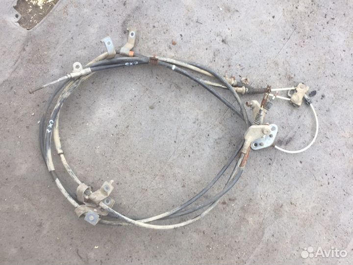 Трос стояночного тормоза Мазда CX-7