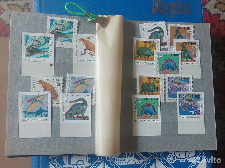 Альбом с почтовыми марками динозавры.Африка.Азия