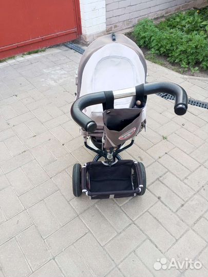 Трехколесный велосипед с ручкой