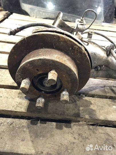 Кулак задний правый Mitsubishi Lancer