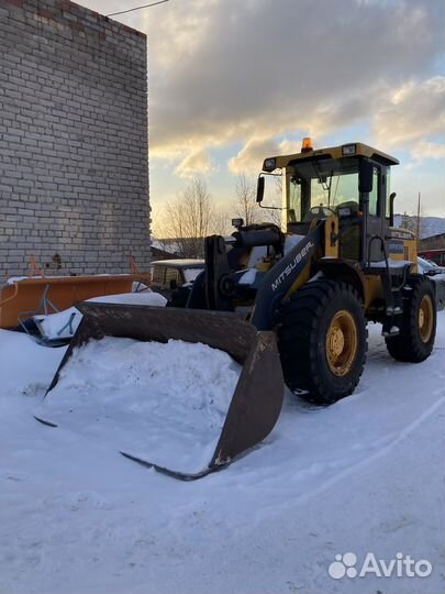 Фронтальный погрузчик