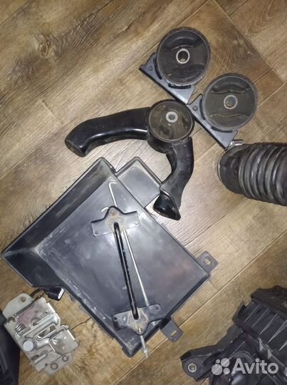 Подушка двигателя lancer 10