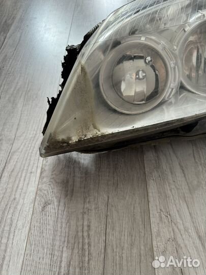 Opel Astra H левая фара