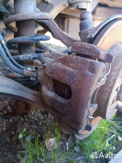 Суппорт тормозной задний Volvo XC 70