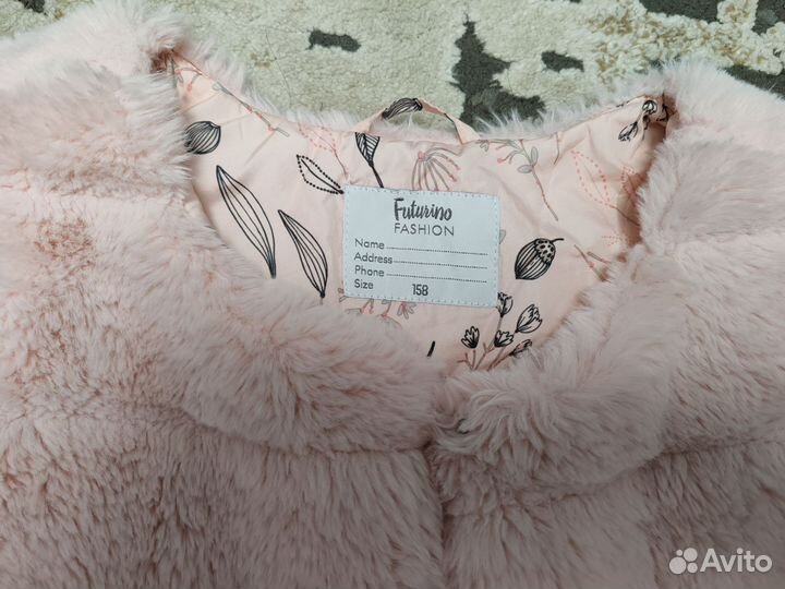 Меховая жилетка