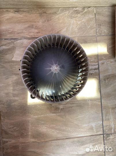 Моторчик отопителя на Опель/Шевроле