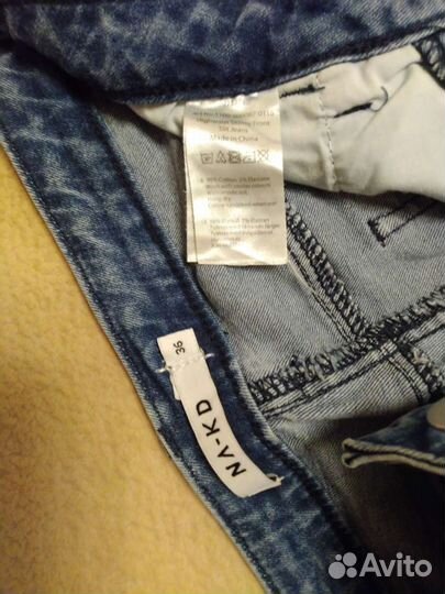 Джинсы новые,с разрезами