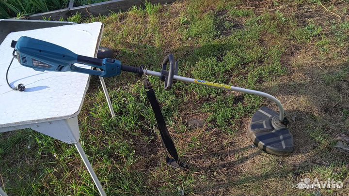 Триммер электрический makita