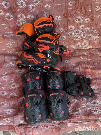 Роликовые коньки