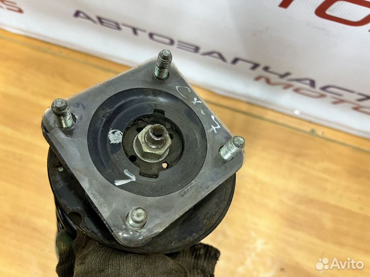 Mazda CX-7 передняя стойка амортизатора левая