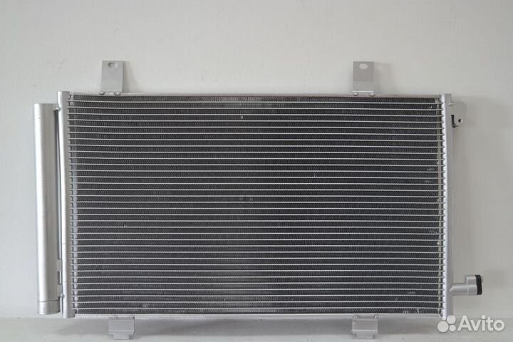 Радиатор кондиционера Сузуки SX4 06