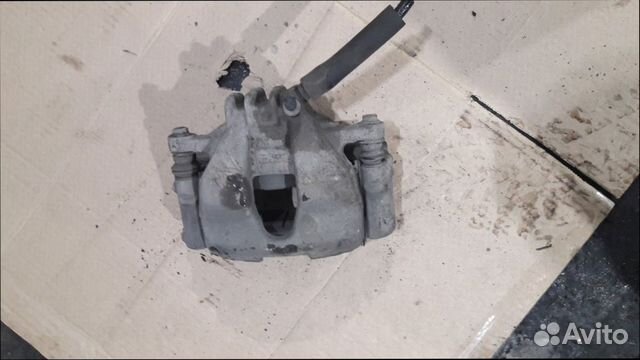 Суппорт тормозной левый передний Peugeot 308 кузов