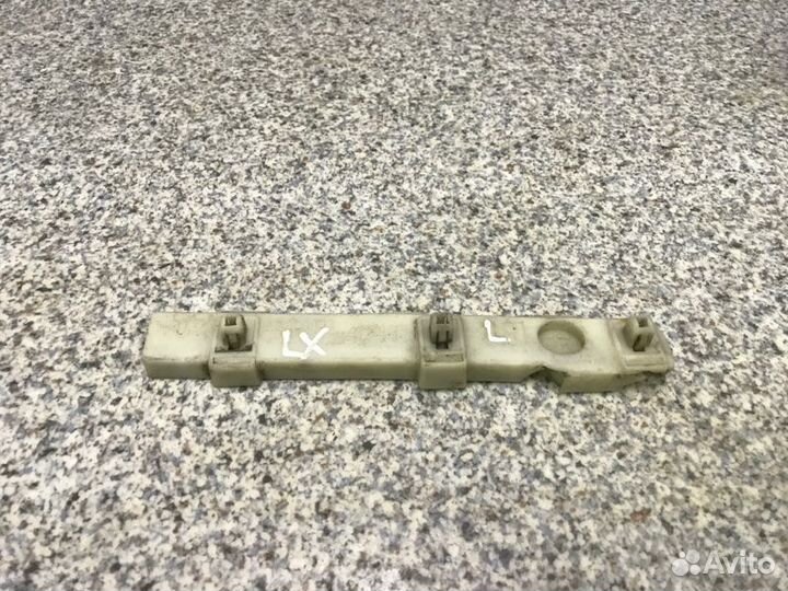 Кронштейн бампера передний левый Mitsubishi Lancer