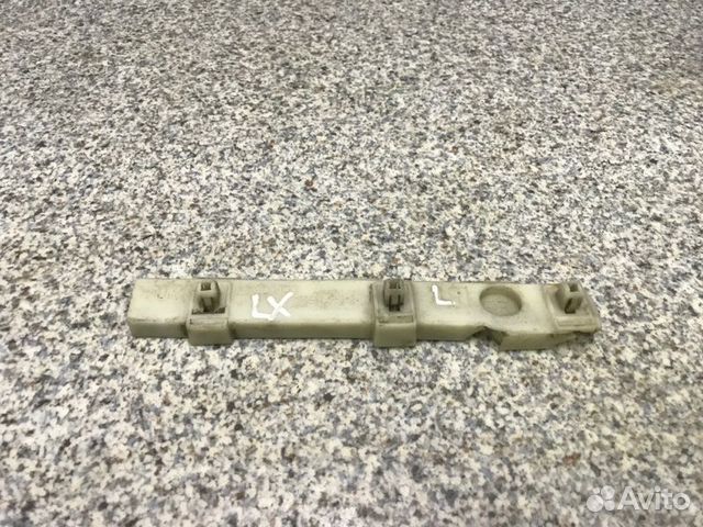 Кронштейн бампера передний левый Mitsubishi Lancer