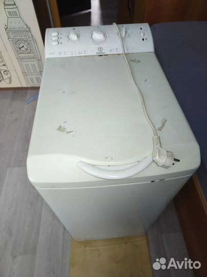 Стиральная машинка с вертикальной загрузкой