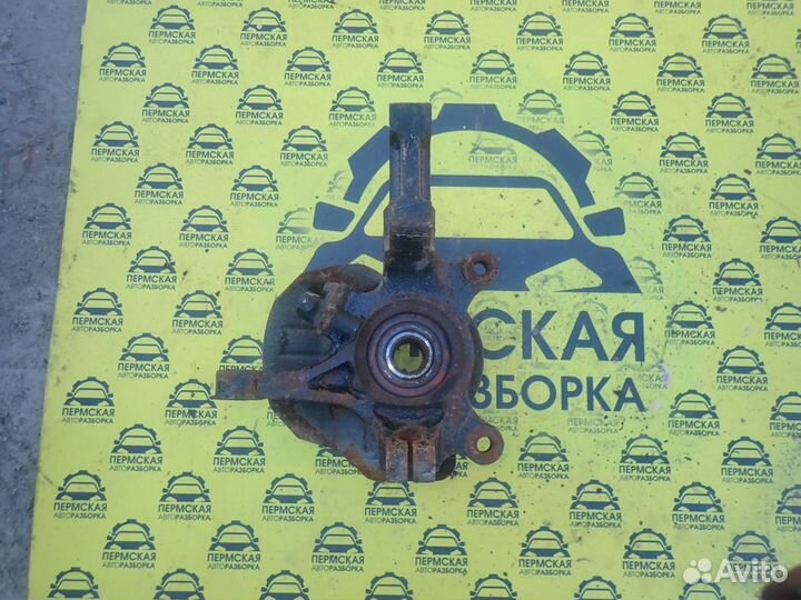 Кулак передний левый Chevrolet Lacetti