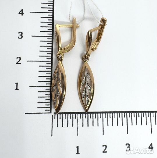 Золотые серьги с камнем