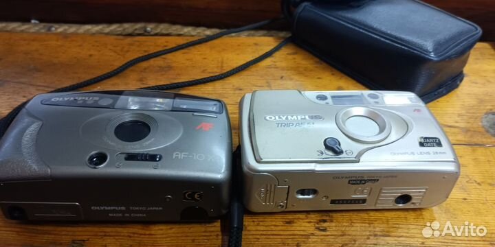 Два Плёночный фотоаппарат Olympus