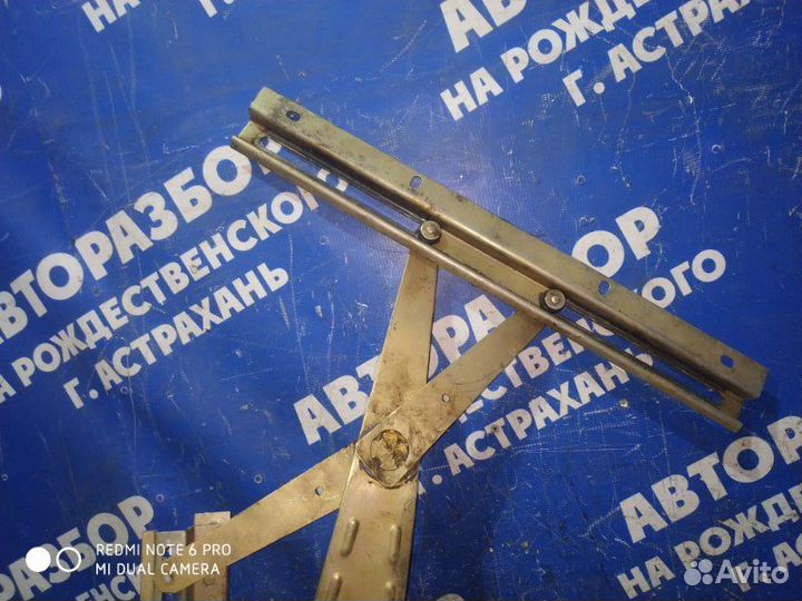 Передний правый стеклоподъемник Газ Волга 3110