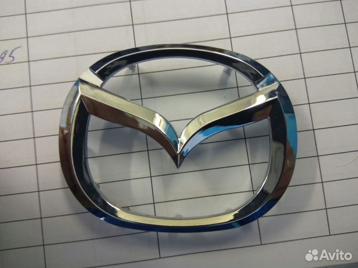 Эмблема мазда