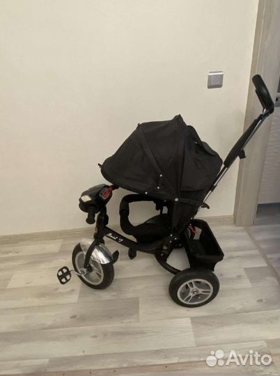 Трехколесный велосипед с родительской ручкой