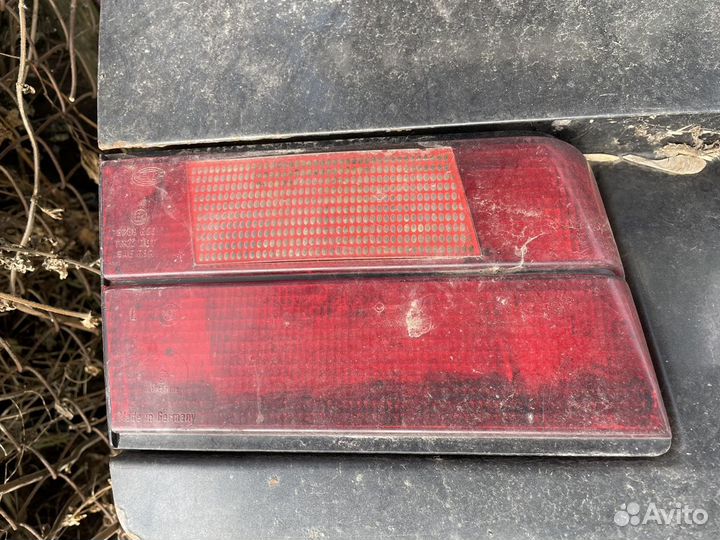 Фонарь левый на крышку багажника BMW E34