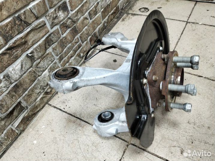 Кулак поворотный задний левый Ford Mustang S550