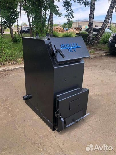 Твердотопливный котел с топкой под уголь и дрова