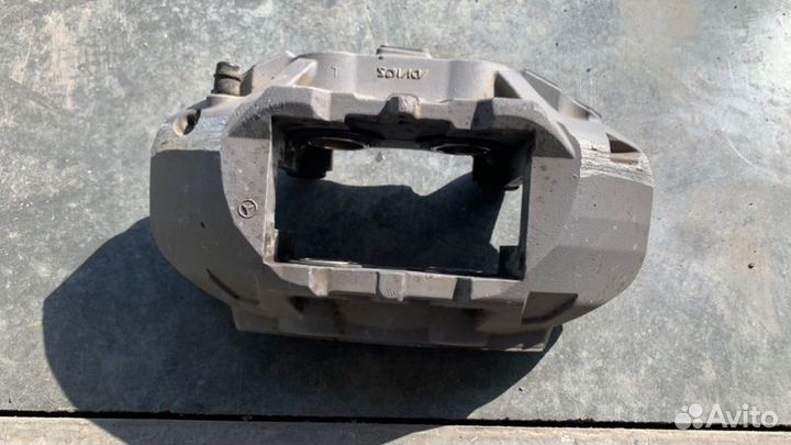 Суппорт тормозной передний левый Mercedes-Benz