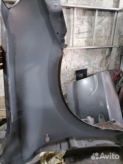 Крыло левое переднее Гранта FL