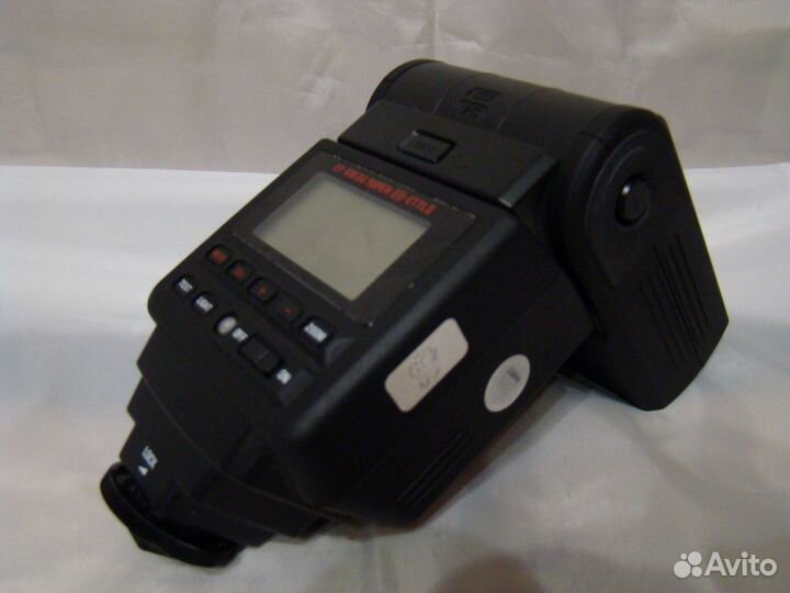 Фотовспышка Sigma для фотоаппарата Canon