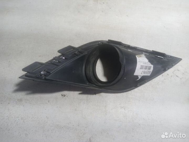 Накладка на туманку передняя левая Mitsubishi