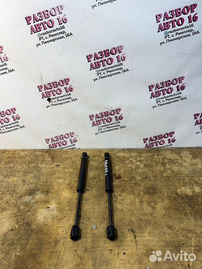 Амортизатор крышки багажника Mitsubishi Lancer 10