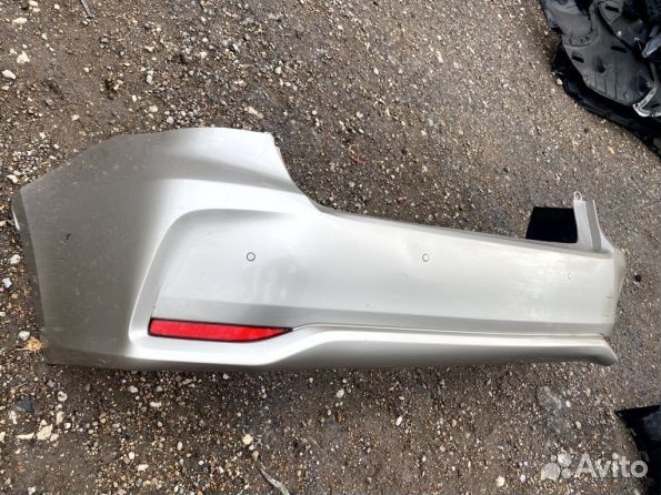 Бампер задний Toyota Corolla E210