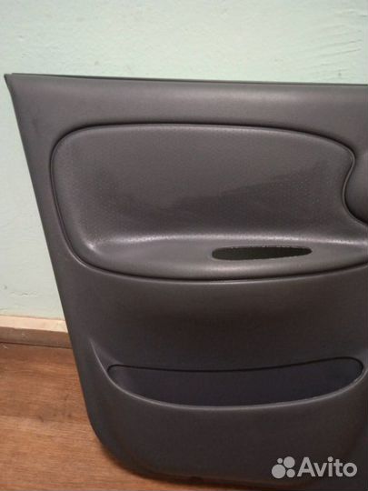 Обшивка двери передняя левая Chevrolet Lanos седан