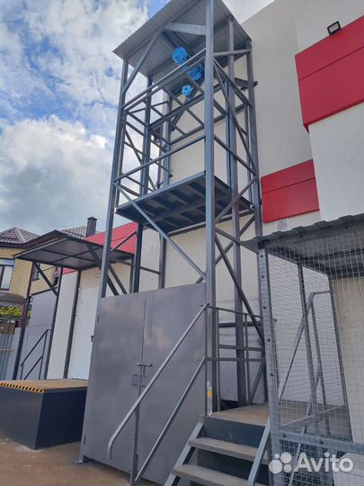 Грузовой подъёмник (лифт) консольный / мачтовый