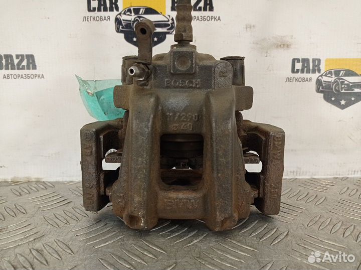 Суппорт тормозной задний правый R BMW 1