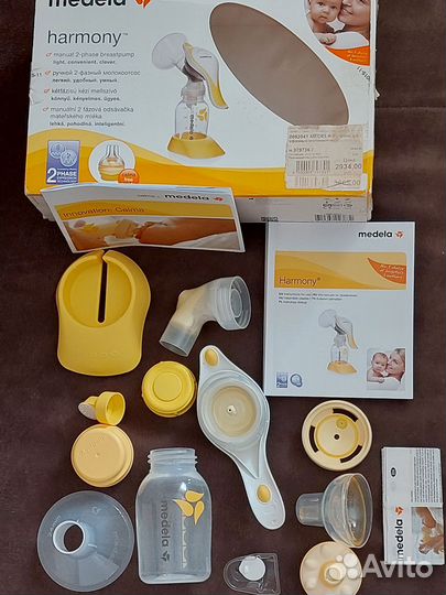 Молокоотсос ручной Medela +SMART соска Calma