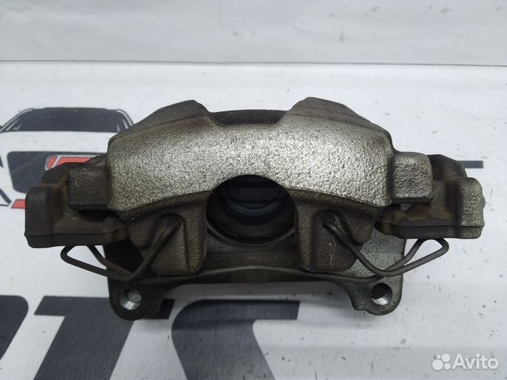 Суппорт тормозной передний Volkswagen Tiguan I рес