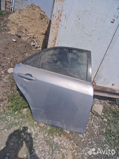 Задняя правая дверь мазда 6 gg