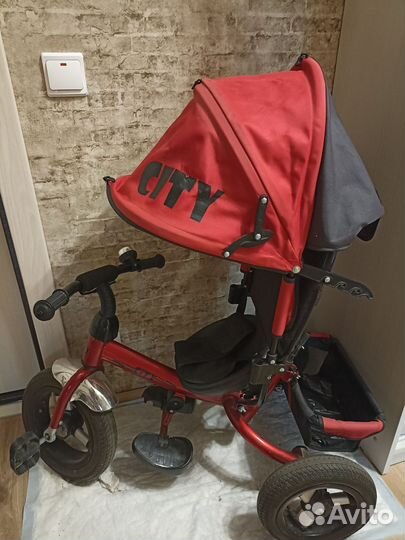 Велосипед трёхколёсный с ручкой