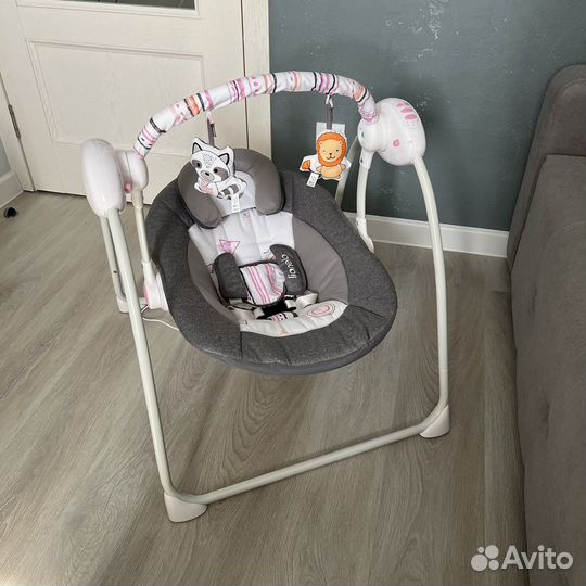 Электронные качели для новорожденных